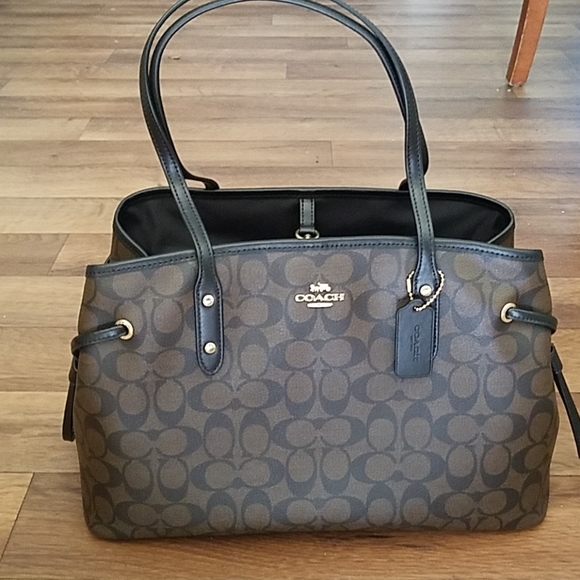 Coach Handbags - Coach Drawstring Carryall Signature Brown / Black